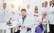 © ASDF - group of doctors and scientists standing in the laboratory.