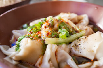 Wall Mural - meat dumpling in chili oil