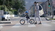 © Marco - Child crossing street in city crosswalk with mother outdoors