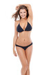 © Marius V/peopleimages.com - Beautiful sexy woman, bikini and smile posing in fashion lingerie for summer style against a white studio background. Portrait of happy isolated attractive female model in swim suit body pose