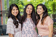 © GAJENDRRA BHATI  - Three Happy indian women standing together at home. Mother with two young daughters. Closeup