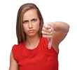 Woman, hand and thumbs down to disagree, failure or disapproval against a white studio background. Portrait of a isolated female pointing thumb down for incorrect, wrong or fail on white background