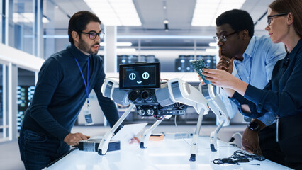 Aufkleber - Multicultural Team of Industrial Robotics Engineers Gathered Around a Table With a Robot Dog. Scientists Use Computers and Connect a Motherboard to a Mobile AI Four-Legged Robot.