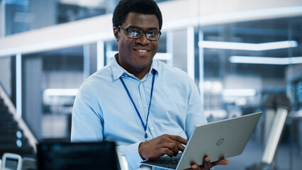 Aufkleber - Portrait of a Handsome African Man Wearing Smart Corporate Wear and Glasses, Looking at Camera and Smiling. Businessman, Information Technology Manager, Developer, Robotics Engineering Specialist.