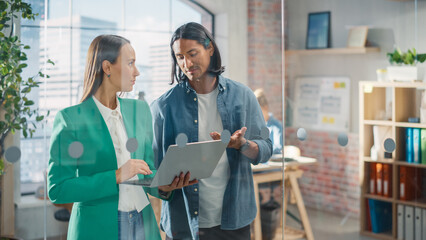 Poster - Businesspeople in Modern Office: Business Meeting of Two Managers Using Laptop. Female CEO and Operations Director Talk, Discuss Corporate Strategy, Implementing Marketing and Financial Plans