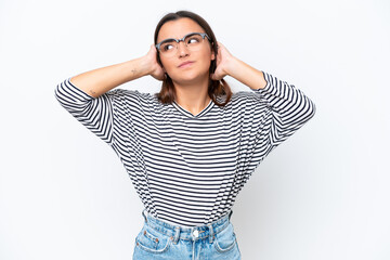 Poster - Young caucasian woman isolated on white background frustrated and covering ears