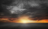 Fototapeta Zachód słońca - Dark Dramatic Sky Horizon Epic Sunset Clouds Landscape with Black Concrete Floor