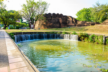 Poster - Ancient brick wall and overflow weir