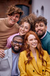 © Roman - Close-up Portrait of Cheerful Diverse Business People Posing At Camera Outdoors, Cheerfully Smiling, Wearing Fashionable Elegant Clothes. Friendly Caucasian And Afro American Colleagues