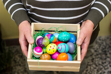 Senior Woman Hands Holding Colorful Easter Eggs