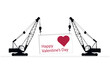 The cargo is held by two self-propelled construction cranes. Happy Valentine's Day, celebration concept.