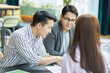 © offsuperphoto - businessman meeting and talking about work or project with colleague in the office