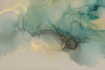 Art Abstract watercolor and alcohol ink flow blot painting. Blue, beige color with gold glitter. Canvas marble texture background.