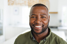 Portrait Of Happy African American Man Looking At Camera And Smiling