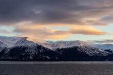 Scenic Snow Covered Mountain Landscape In Anchorage, Alaska Looking Over Chickaloon Bay And Turnagain Arm