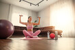 © ivanko80 - Attractive woman exercising at home
