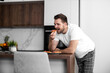 © ivanko80 - Man having breakfast in the kitchen