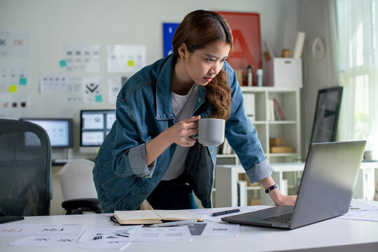 Asian woman Graphic designer working in office. Artist Creative Designer Illustrator Graphic Skill Concept.