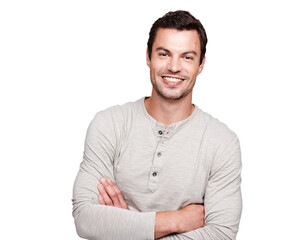 Man, smile and arms crossed with teeth and vision for happy ambition, goals or profile against white studio background. Portrait of a isolated young male smiling with crossed arms on white background