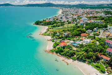 Tropical holiday beach with turquoise sea in Brazil. Aerial view