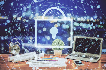 Poster - Double exposure of desktop with computer and lock icon hologram. Concept of data safety.