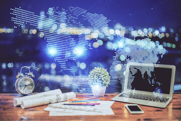 Poster - Computer on desktop with social network hologram. Double exposure. Concept of international people connections.