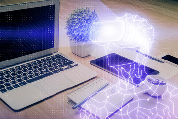 Poster - Computer on desktop with AR theme icon. Multi exposure. Concept of augmented reality.
