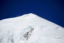 Ski Tracks And Rock Climbers Below Mont Blanc Du Tacul, Chamonix, Mont-Blanc, France