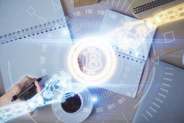 Poster - Cryptocurrency hologram over woman's hands writing background. Concept of blockchain. Double exposure