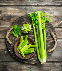 Wall Mural - Fresh celery on a tray.