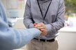 © Austockphoto - Close up of doctor's hands reassuring his patient