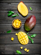 Pieces of fresh mango in bowl.