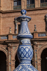 Wall Mural - Architectural details of the picturesque renaissance and Moorish building styles in the Spain square (Plaza de Espana). Seville, Andalusia, Spain.