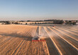Agriculture: Panoramic aerial landscape view of combine harvester working in the wheat field