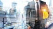 © alphaspirit - Successful businessman engineer with city and skyscrapers background