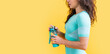 fitness woman with sport water bottle, cropped view. fitness woman hold sport water bottle