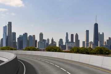 Empty urban asphalt road exterior with city buildings background. New modern highway concrete construction. Concept of way to success. Transportation logistic industry fast delivery. Chicago. USA.