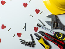 Construction Tools, Hard Hat On White Background With Small Red Hearts And Copy Space. Construction Greeting Card For Valentines Day. Repair Home With Love. Gifts For Lover. Buying Presents For Man.