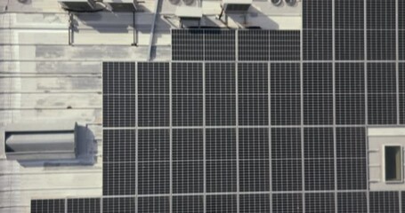 Poster - Solar energy, drone or roof construction engineering, architecture or energy sustainability. Aerial view, solar panels or industrial team working on project management, city logistics or innovation