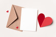 Blank Valentines Day greeting card mockup with red heart and envelope