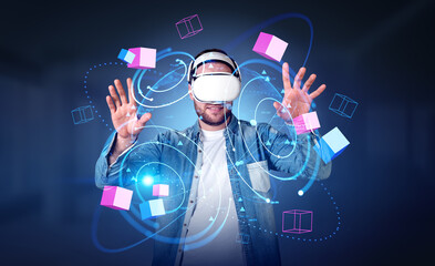 Poster - young man in vr glasses hands touching blocks in metaverse