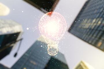 Wall Mural - Virtual Idea concept with light bulb illustration on office buildings background. Multiexposure