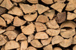 Firewood for heating. A pile of wood. Energy crisis.