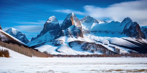 Poster - A snow covered plain with snowy mountains in the background. 