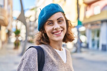 Canvas Print - Young caucasian woman tourist smiling confident walking at street