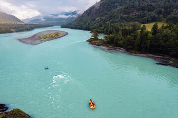 Wall Mural - Team extreme rafting on red boat on stormy blue river Altai, Aerial top view. Concept adventure travel