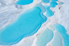 Aerial Top View Pamukkale Travertine Pools, Terraces With Blue Water. Concept Travel Landmark Turkey