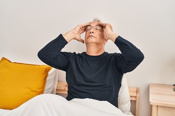 Poster - Senior man stressed sitting on bed at bedroom