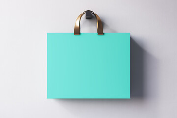 Wall Mural - Close up of blue shopping or present bag on light background. Mock up, 3D Rendering.