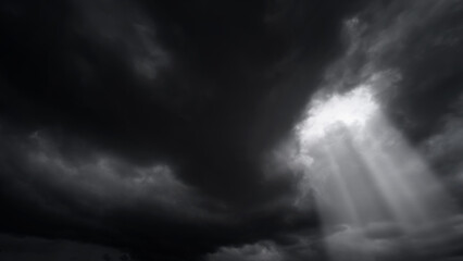 Wall Mural - dark dramatic sky with black stormy clouds before rain or snow as abstract background, extreme weath